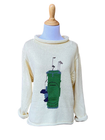 ivory sweater with green golf bag