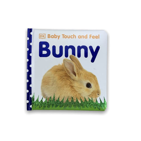 front cover is white and features tan bunny on cover on grass with blue and white polka dots on spin and says "Bunny" in blue
