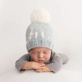 baby wearing blue hi beanie