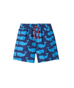 navy blue with lighter blue whales all over and orange drawstring - Hatley swim trunks