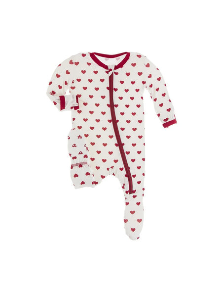 white footie with red hearts and red zipper