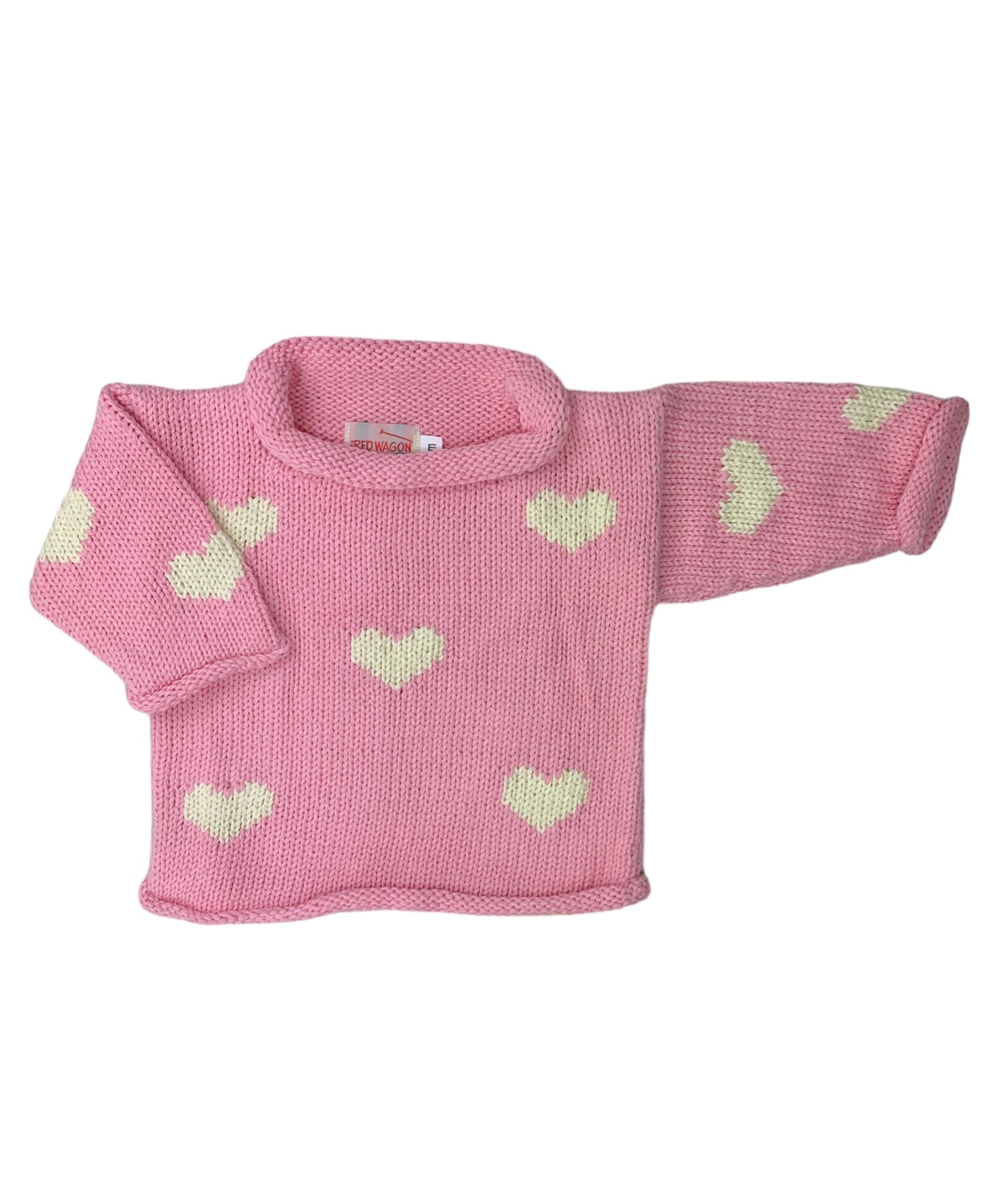 pink long sleeve sweater with ivory hearts all over
