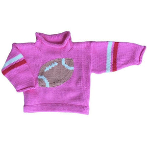 pink roll neck sweater with brown and white football knitted on front center with a double stripe- red and white on each sleeve