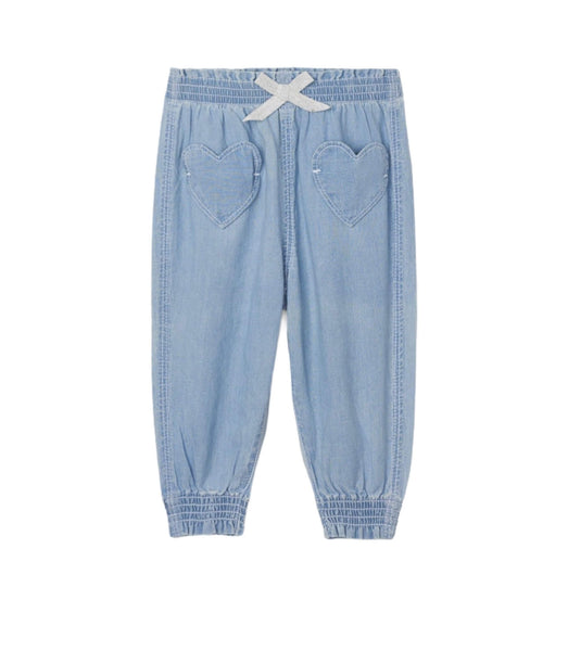 light blue chambray fabric joggers with heart shaped pockets on front, small white bow on the front - Hatley girls pants