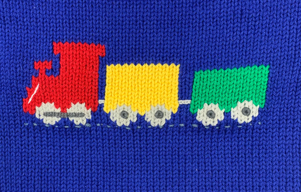 close up of knitted train design