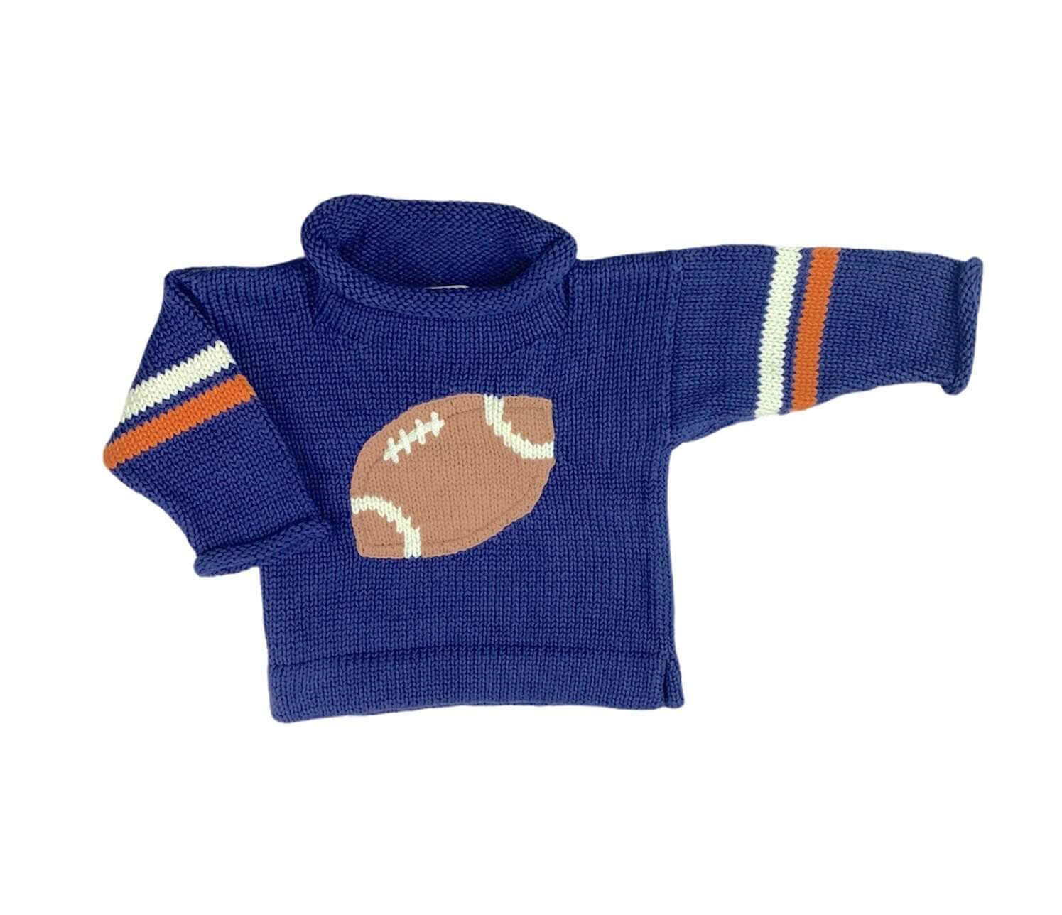 navy roll neck sweater with orange and white stripes, 2 stripes on each sleeve, brown and white football in center