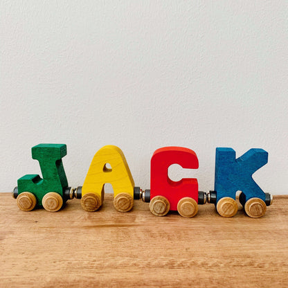 letters spelling out Jack in green, yellow, red and blue