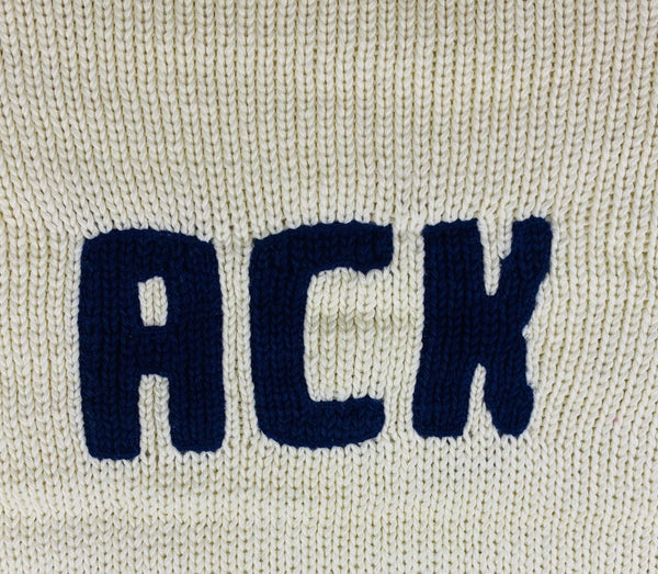 closer look at knitted letters ACK