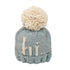 blue knit beanie with hi in ivory and ivory pom