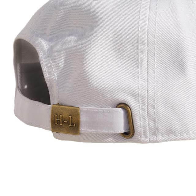 back of hat shows white clasp