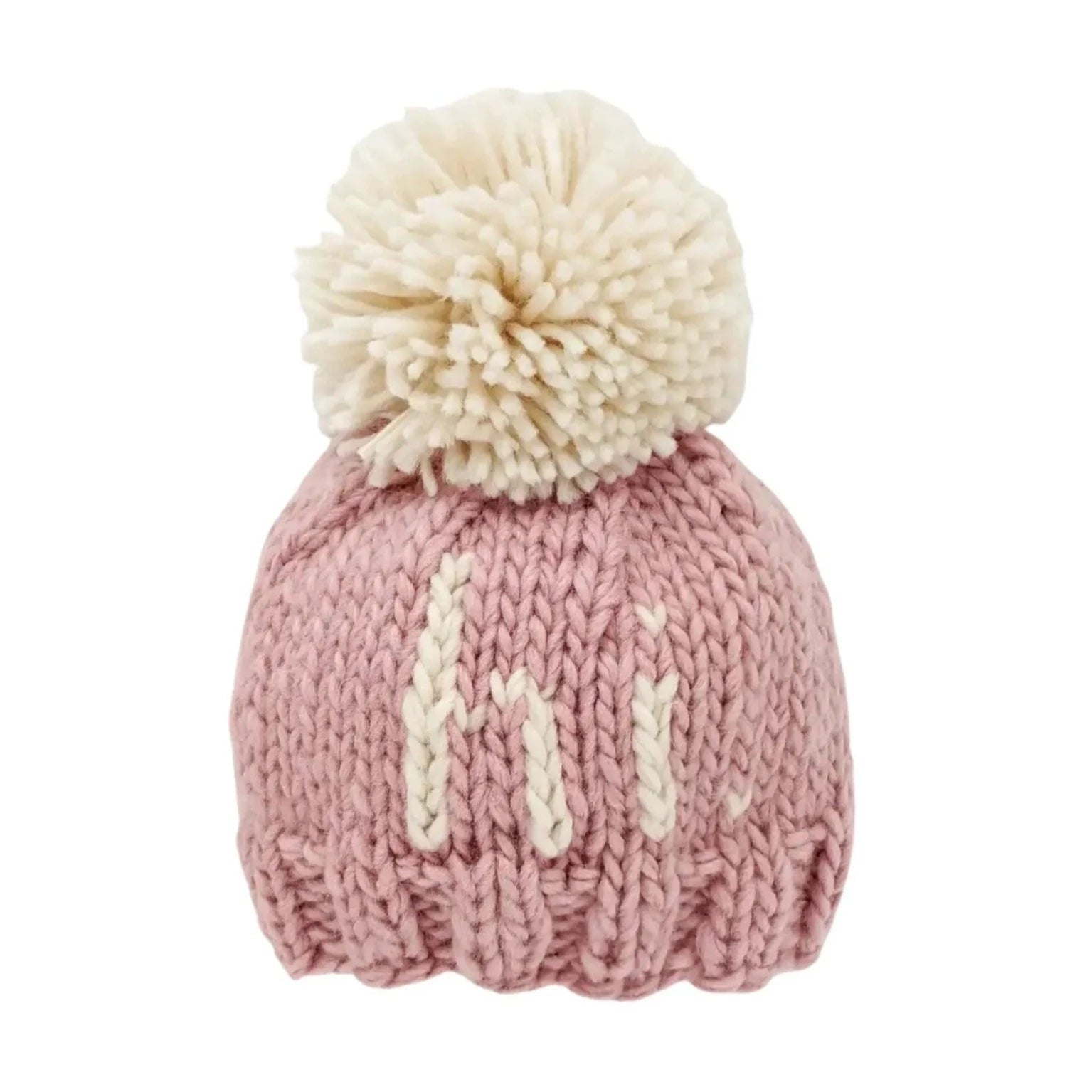 light rosy pink knit hat with natural hi and natural pom at top