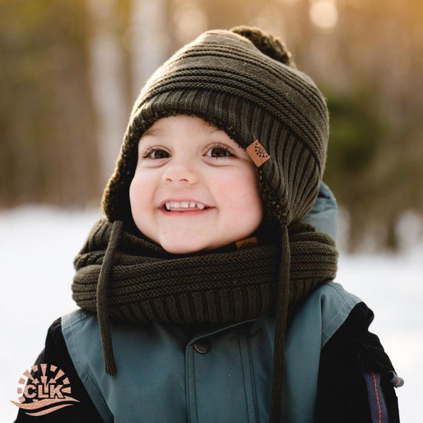 boy wearing hat and smiling