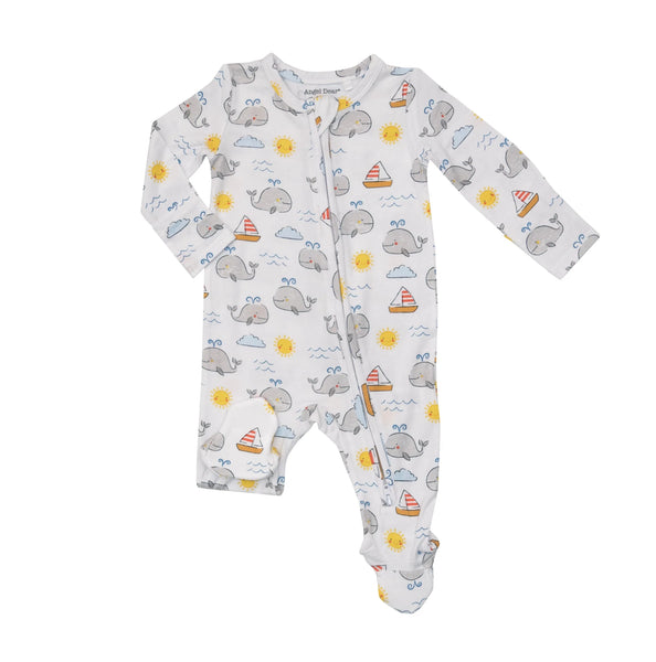 white footie with whales, sailboats, suns, clouds all over